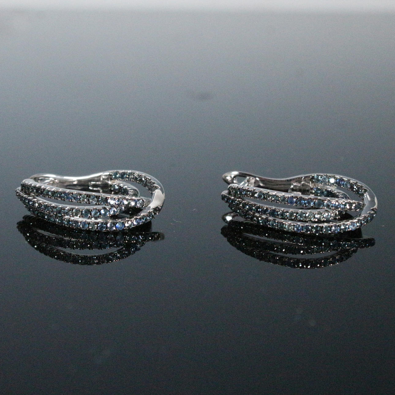 Creoles with sapphires.