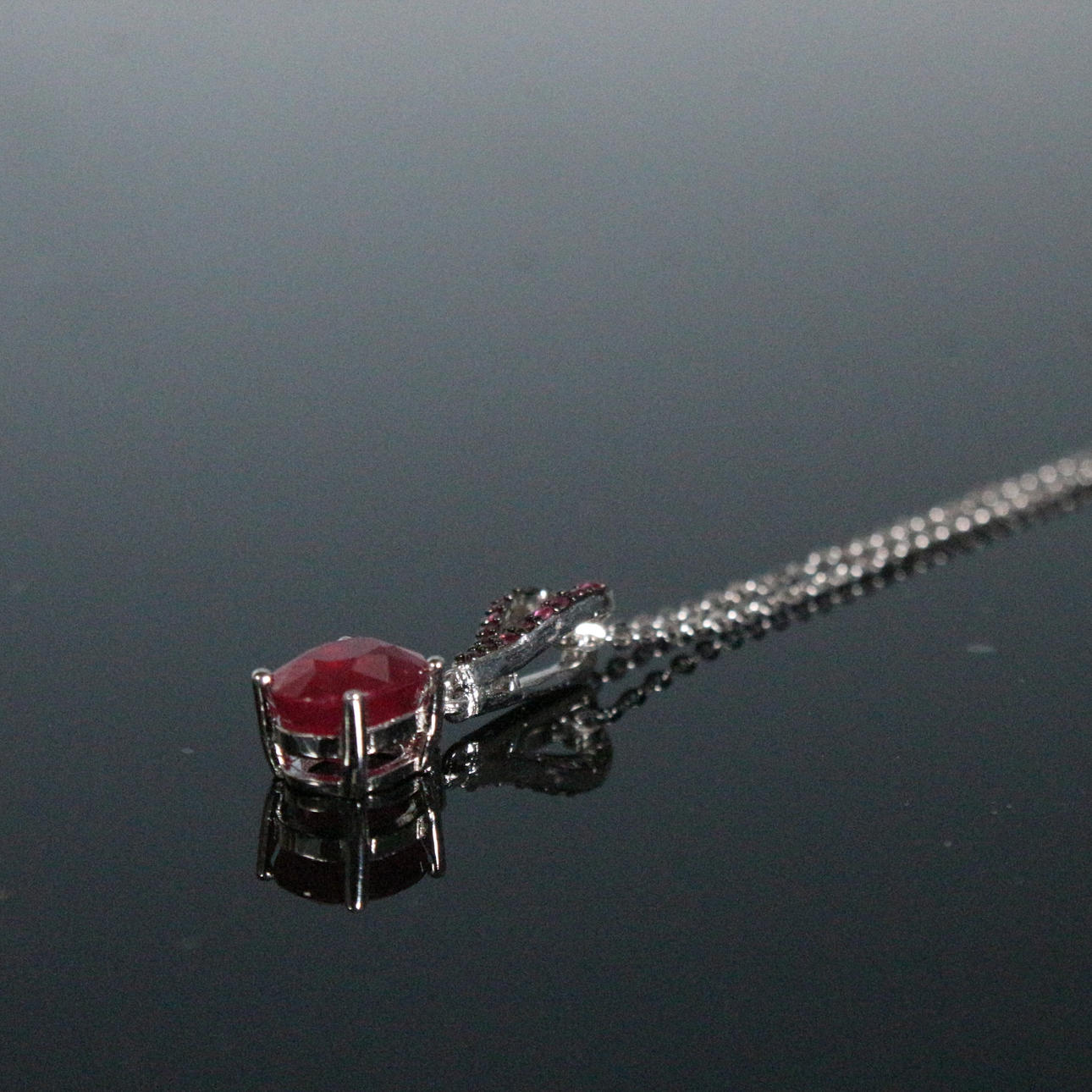 Ruby pendant with chain.