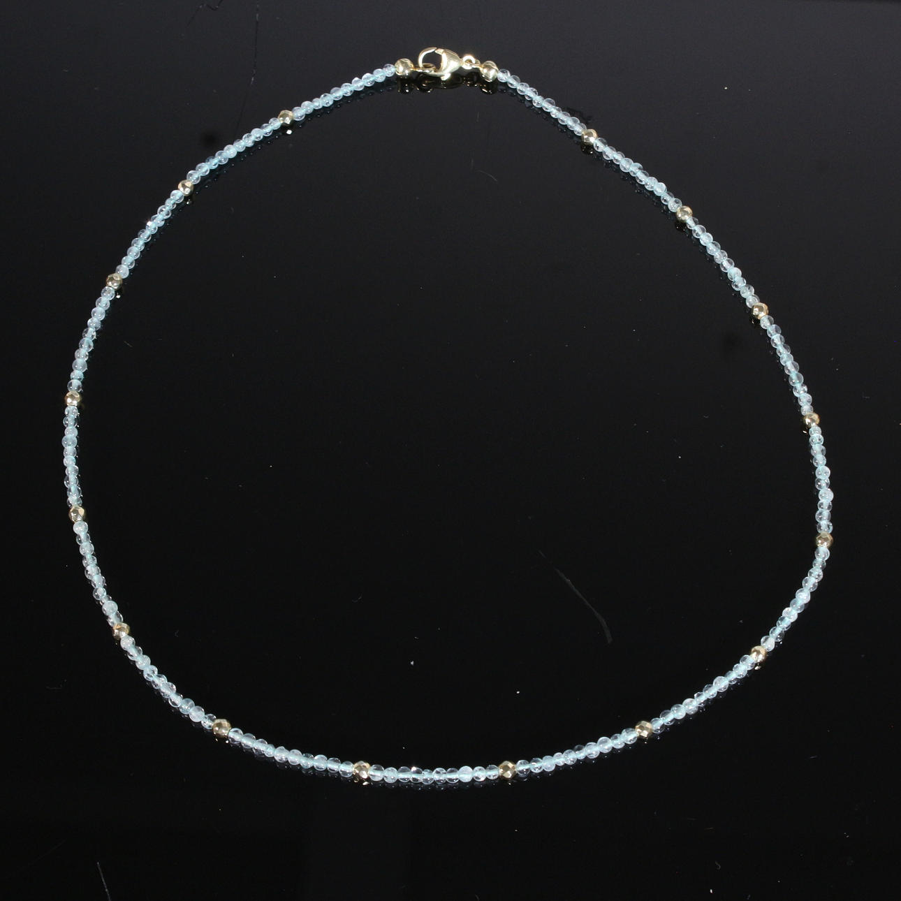 Aquamarine necklace with hematite.