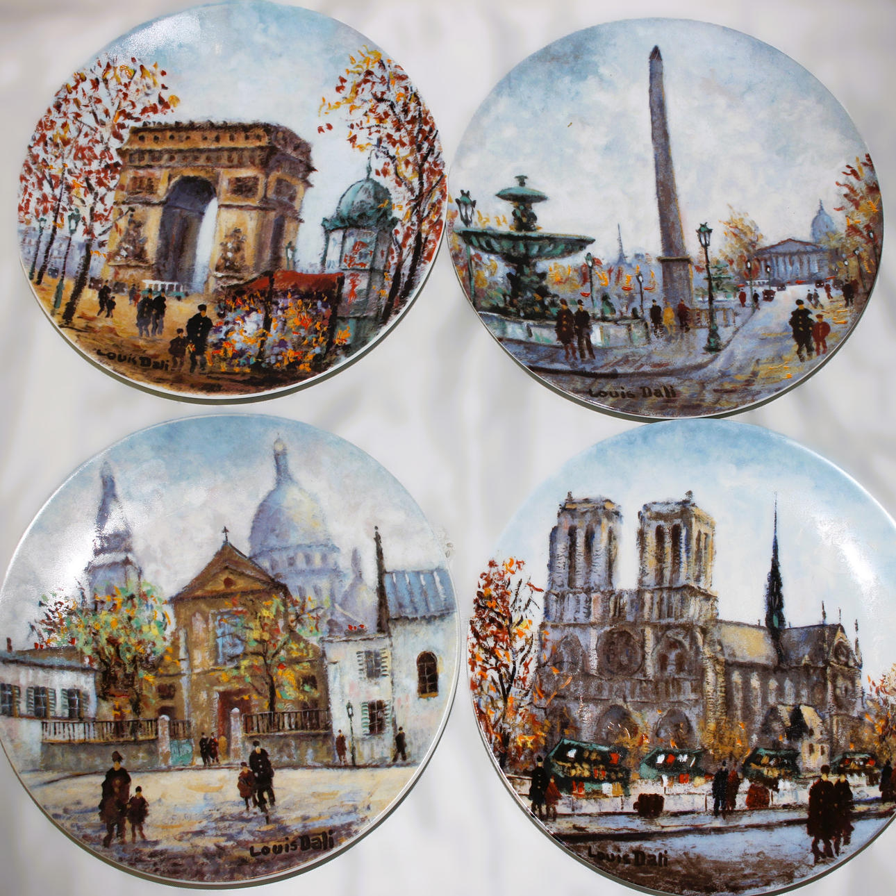 LOUIS DALI DECORATIVE PLATES X 4.