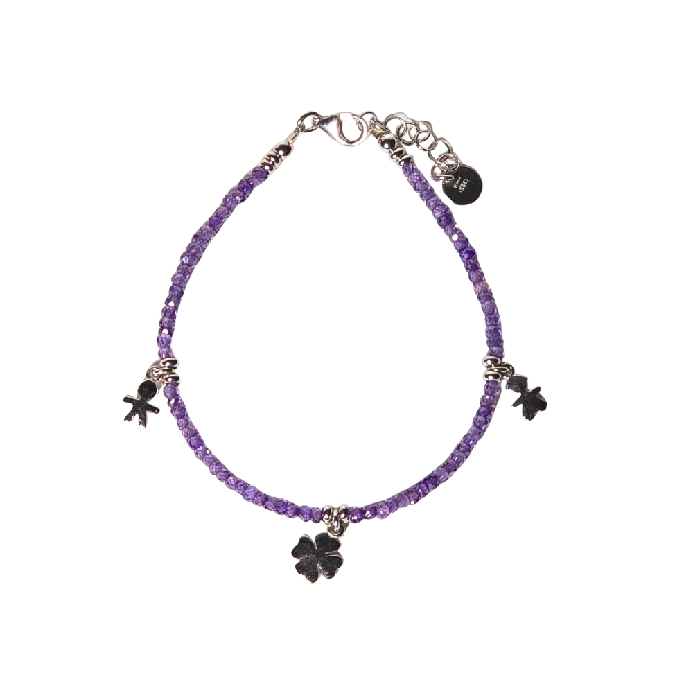 BRACELET WITH SILVER CHARMS AND SPINELS.