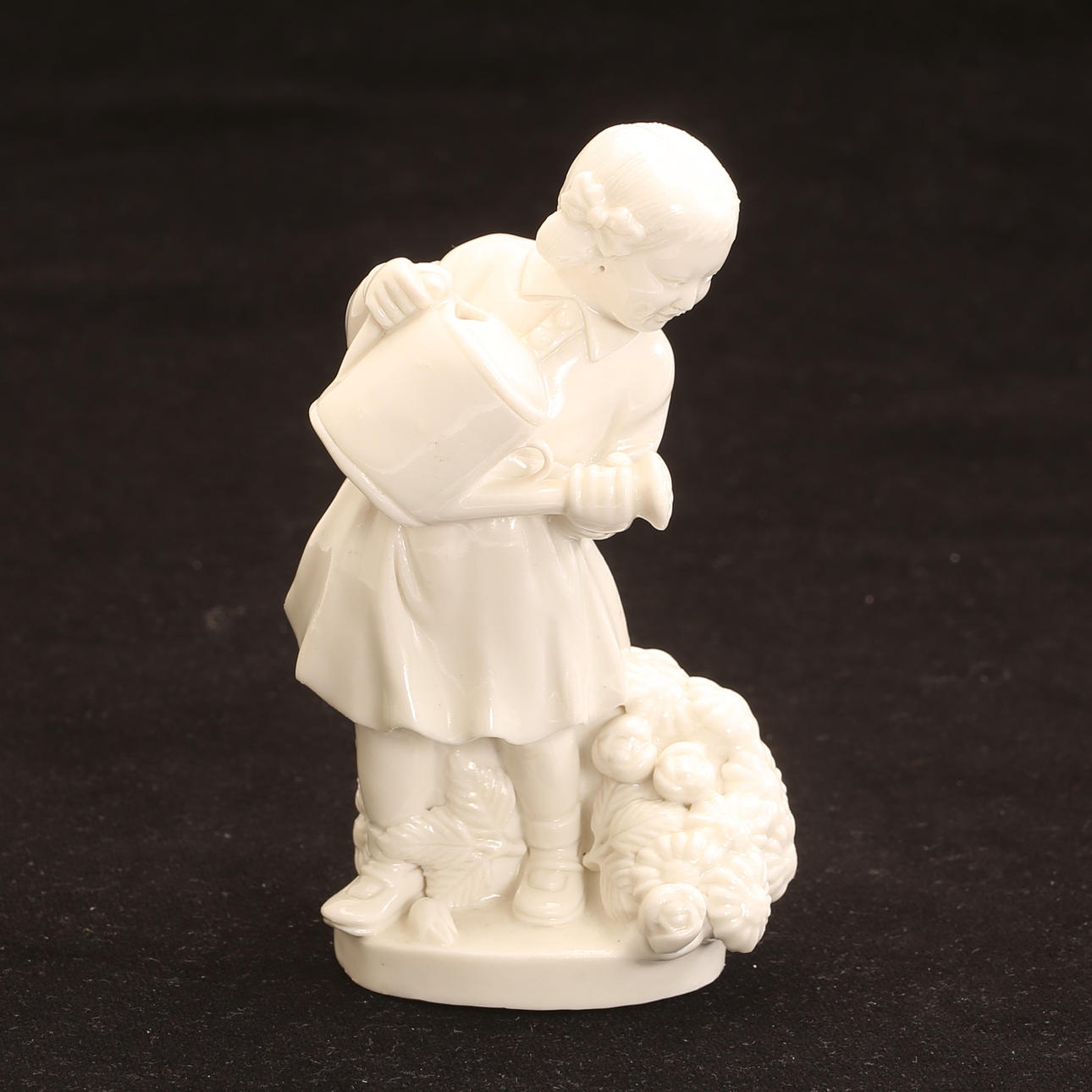 A 20th century porcelain figurine.