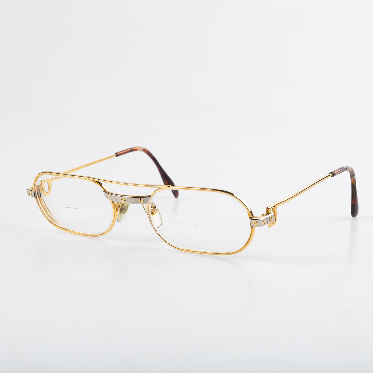 CARTIER MUST SANTOS, Glasses with strength.