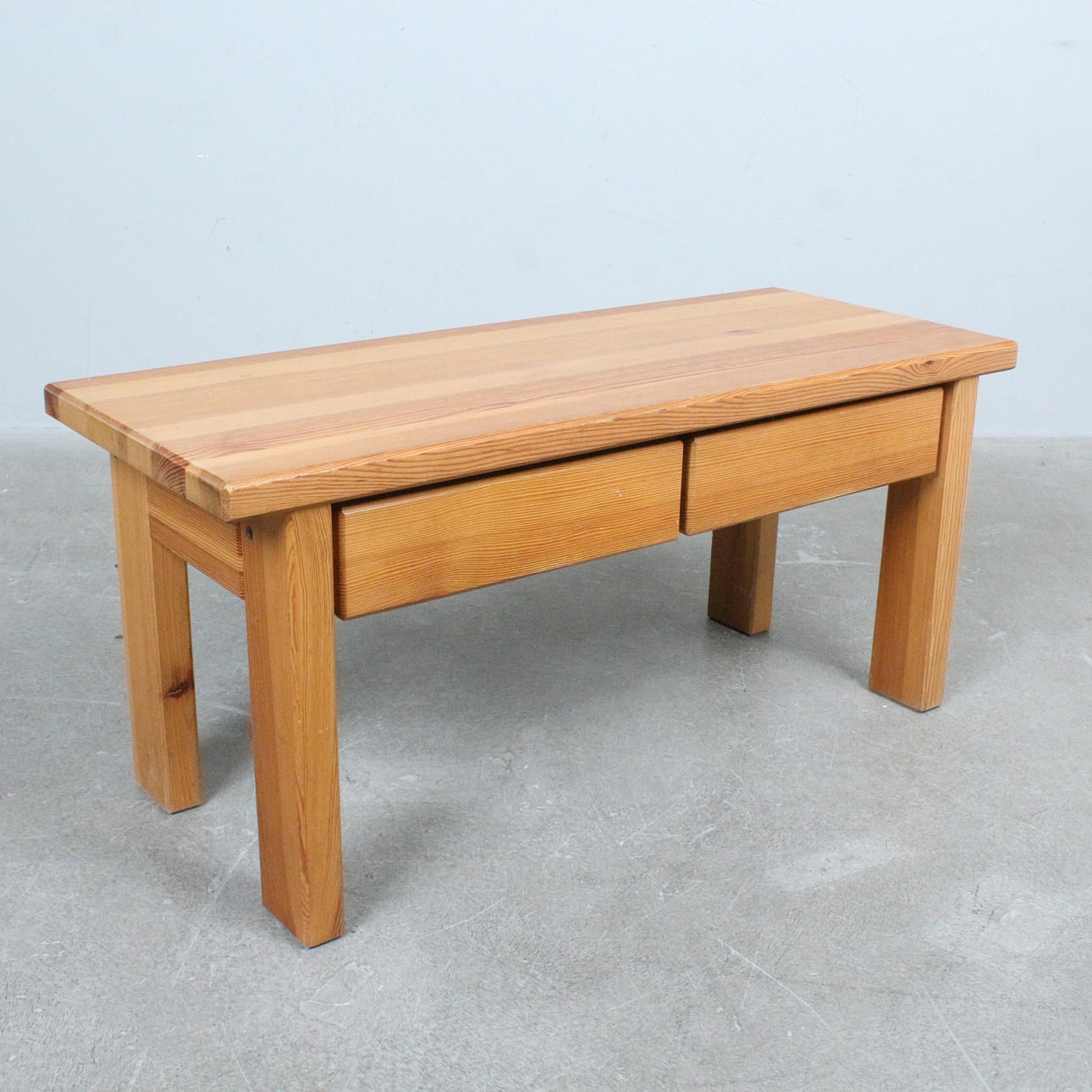 Pine bench with two drawers.