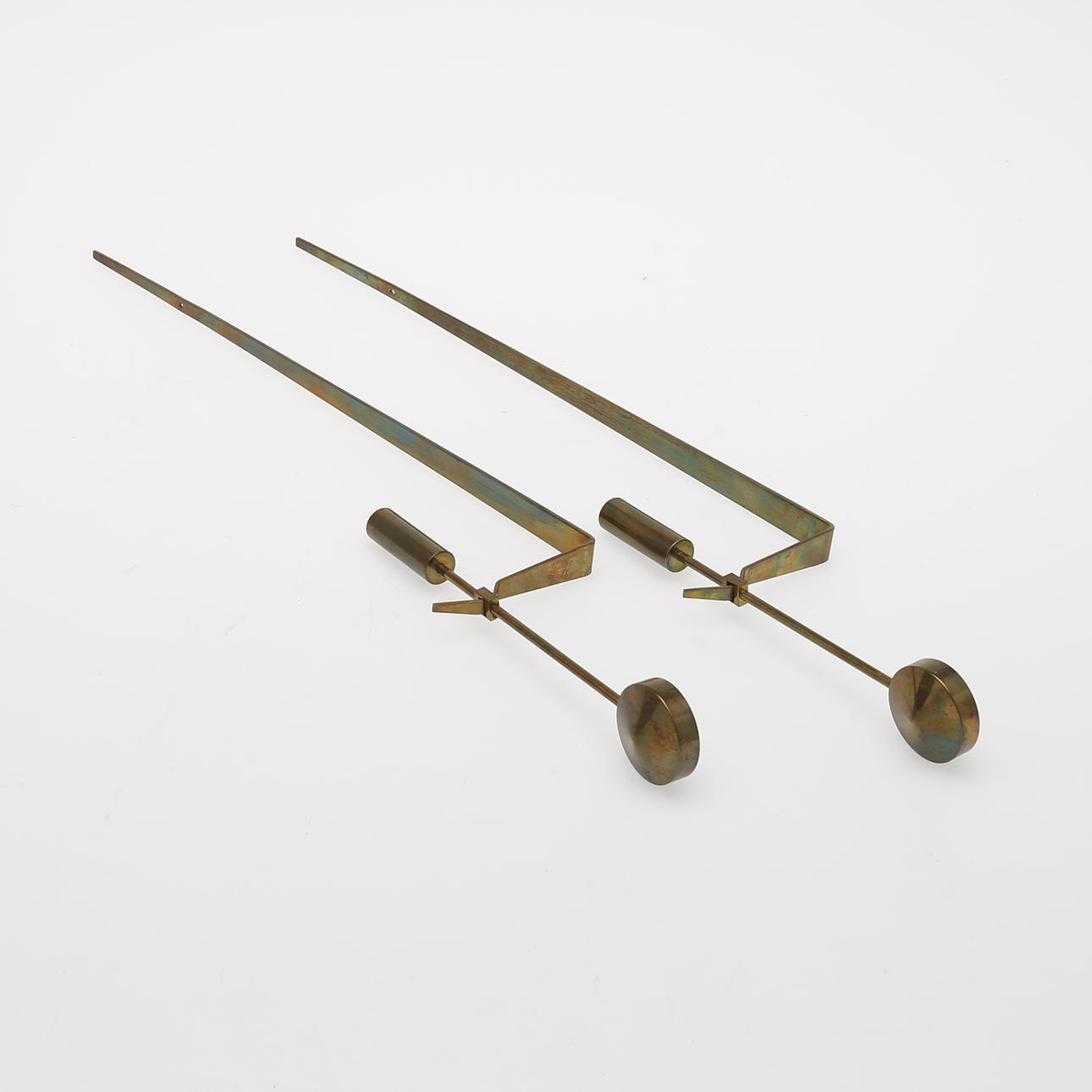 PIERRE FORSELL. LJUSLAMPETTER, ett par, mässing, "Pendel", Skultuna.