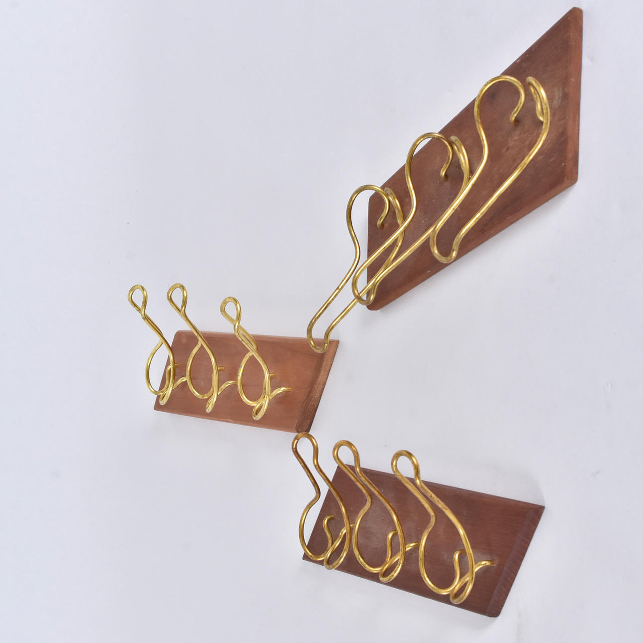 3 TEAK AND GILT BRASS SPOUT STAND.