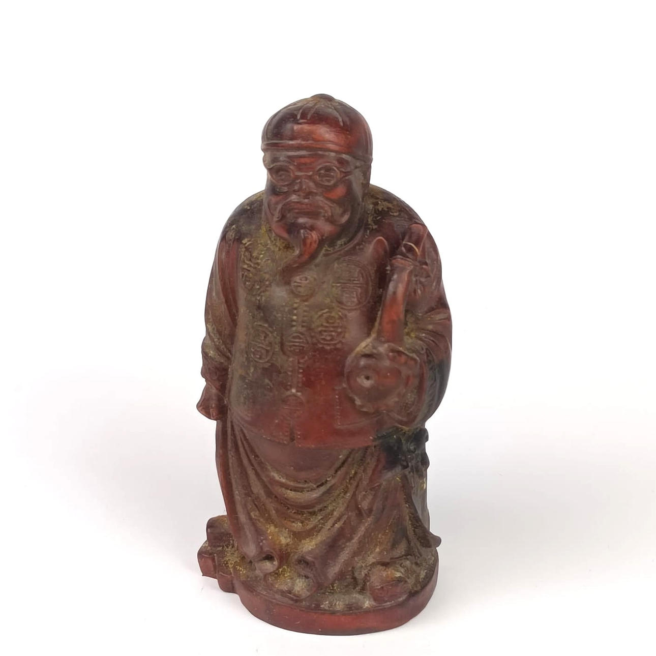 A CHINESE WOODEN FIGURE.