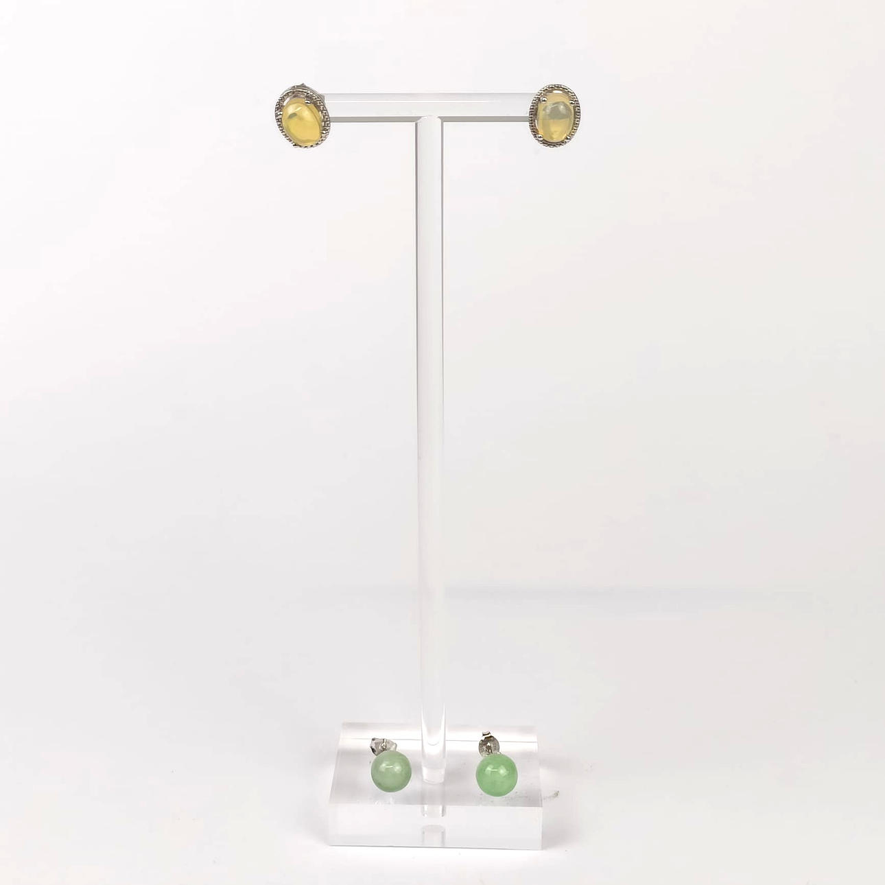 TWO PAIRS OF SILVER STONE SET STUD EARRINGS.