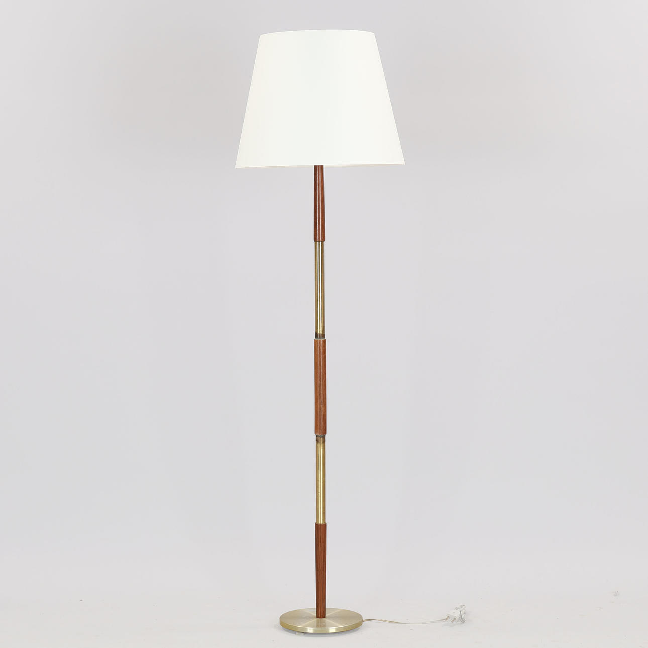 Brass and teak floor lamp, 1960s.