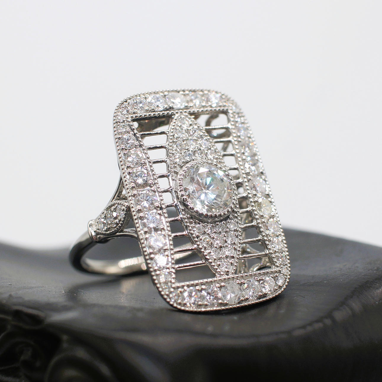 ART DECO STYLE DIAMOND PANEL RING.