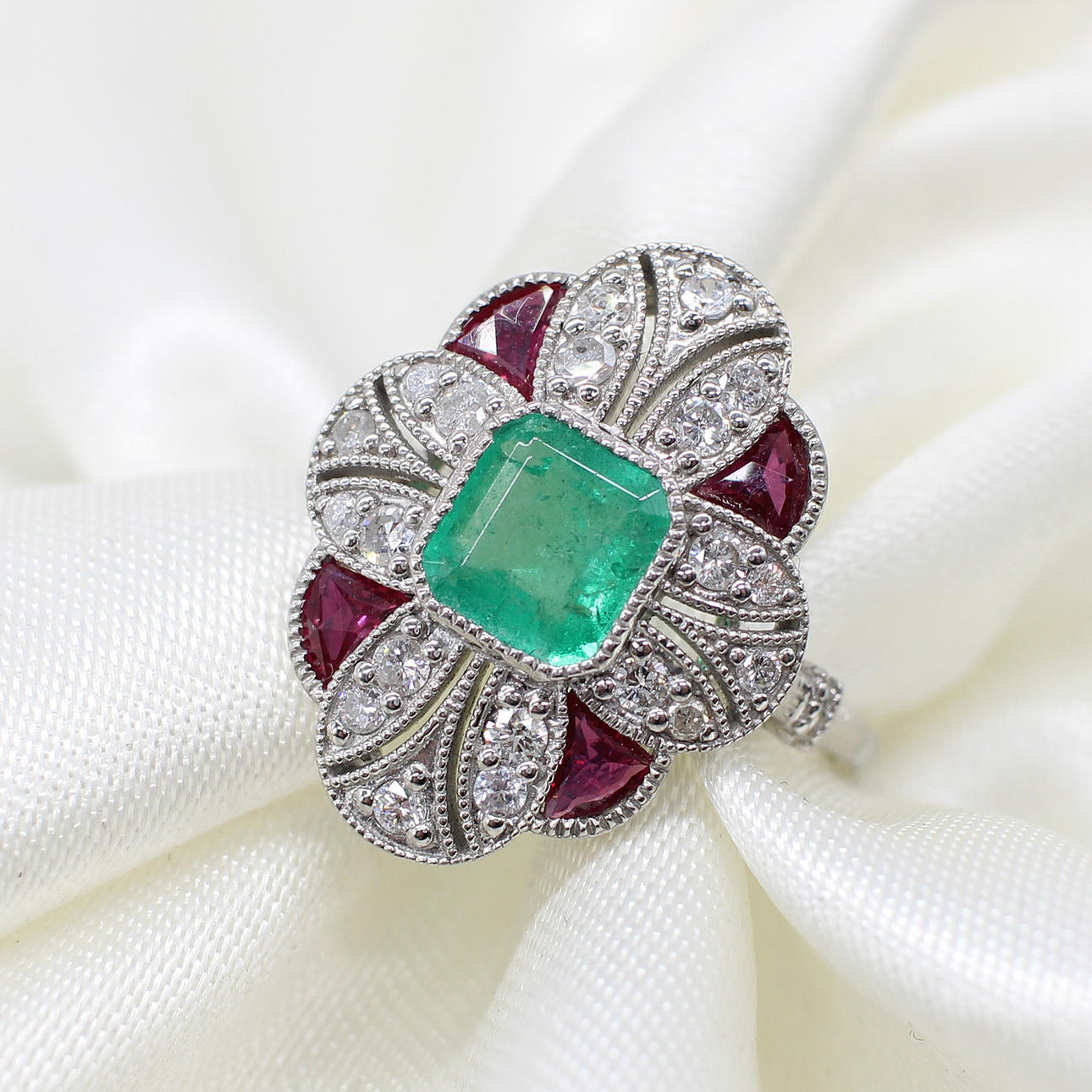 EMERALD, DIAMOND & RUBY ART DECO STYLE RING.