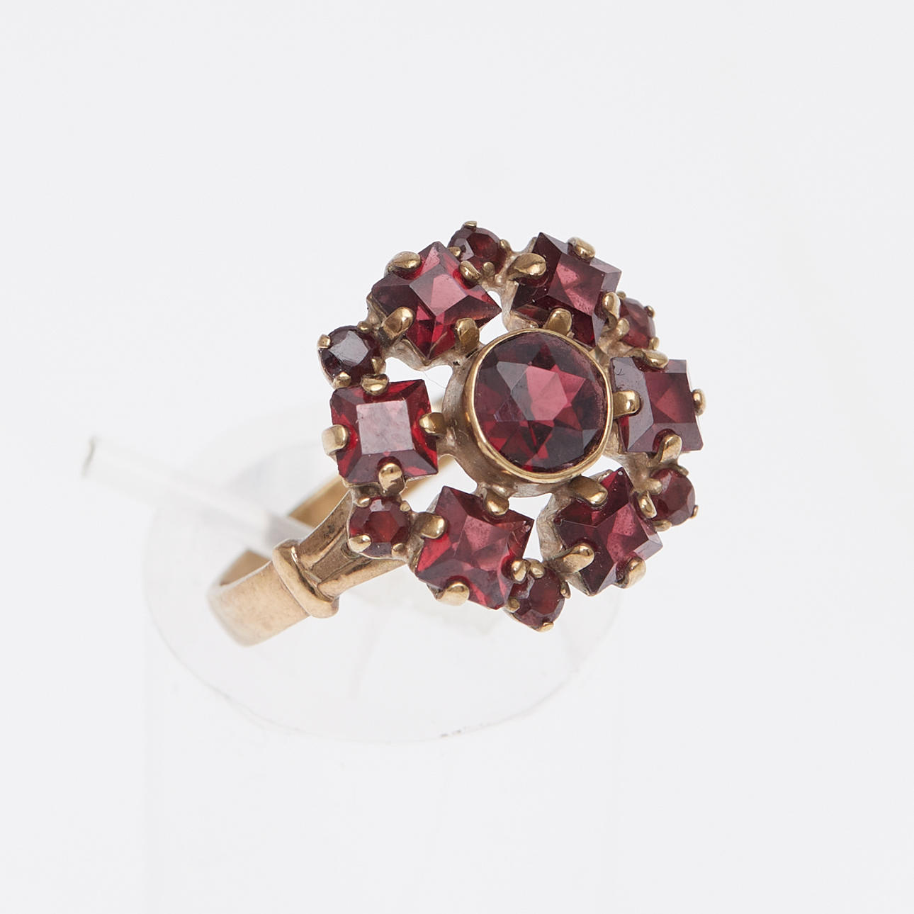 333 yellow gold garnet ring.
