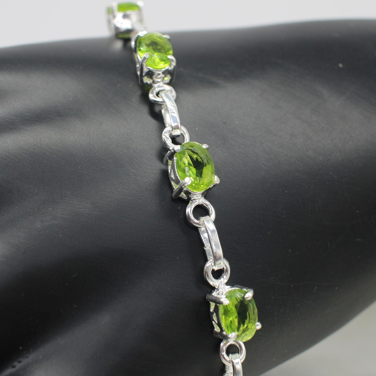 PERIDOT SET SILVER DRESS BRACELET.