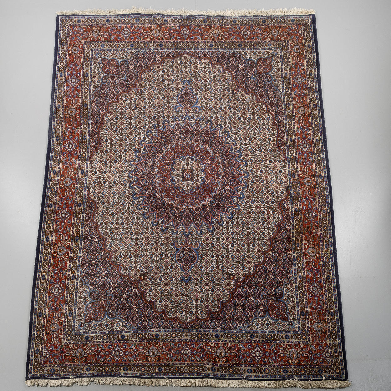 A CARPET, Persian Moud, ca 307 x 208 cm.