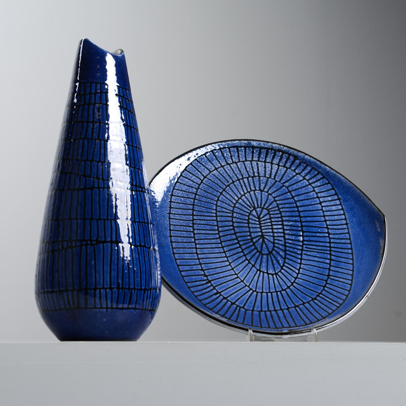 INGRID ATTERBERG. Vase and saucer, unique, Upsala-Ekeby, signed.