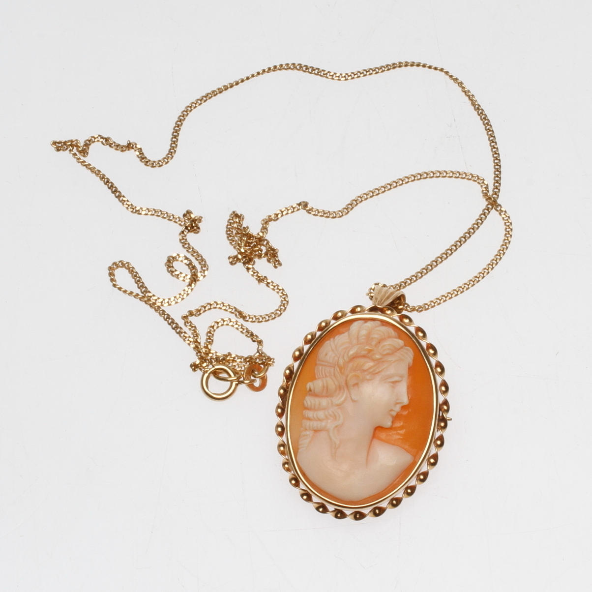 HALSSMYCKE/BROSCH, guld, 18k med camé, total vikt ca. 11,6 gram.