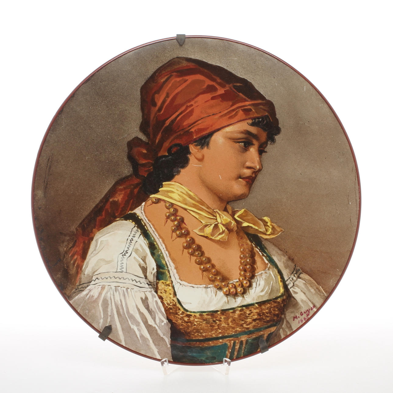 DEKORATIONSTALLRIK, Motiv av kvinna, märkt M. Guyon, 1888.