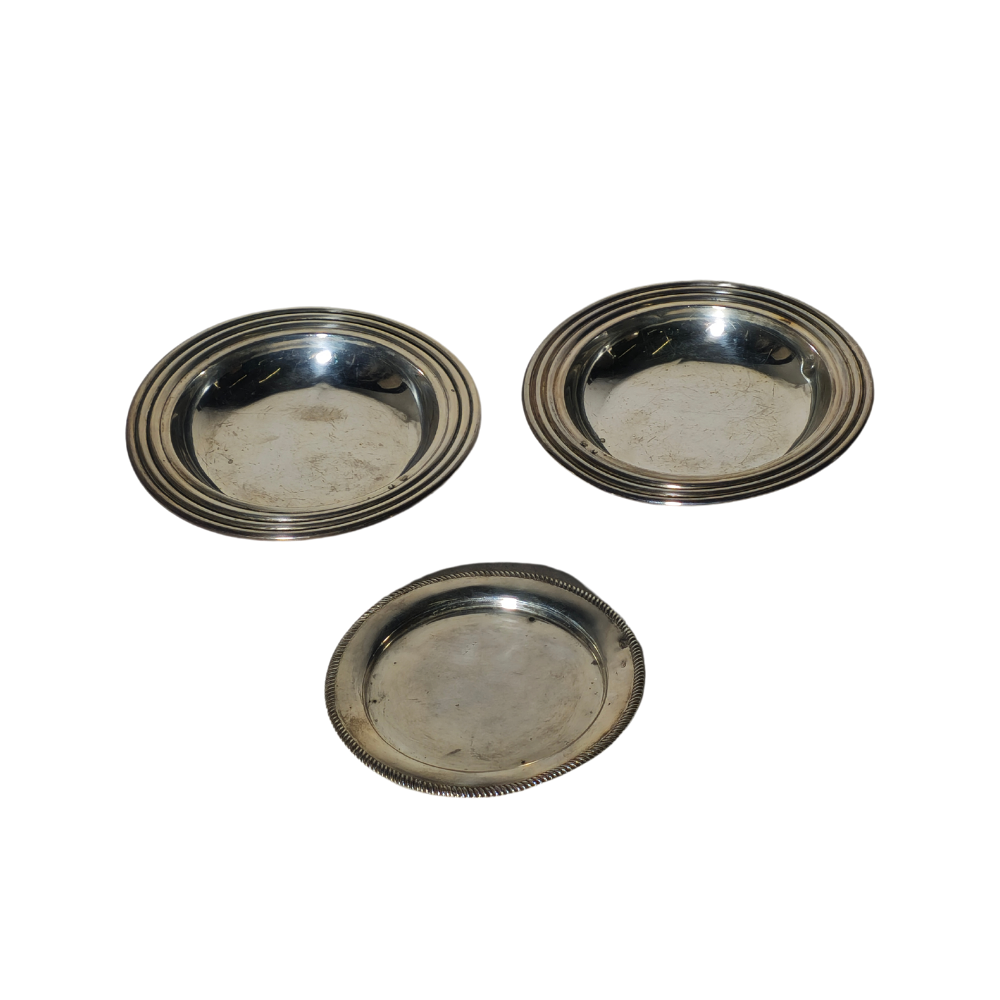 THREE PLATES IN PUNCHED SPANISH SILVER.