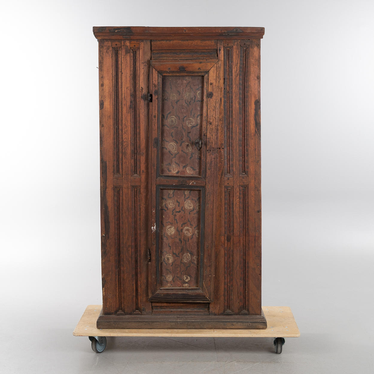 A cupboard, 18th century, partly painted.