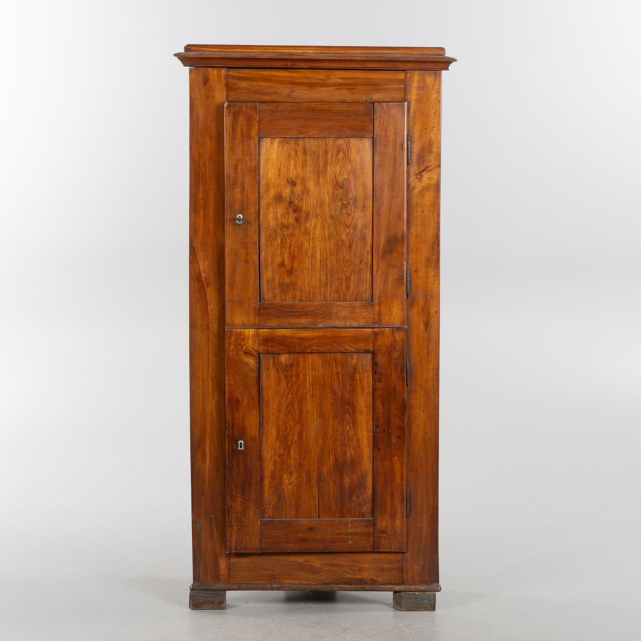 A mid 19th century corner cabinet.