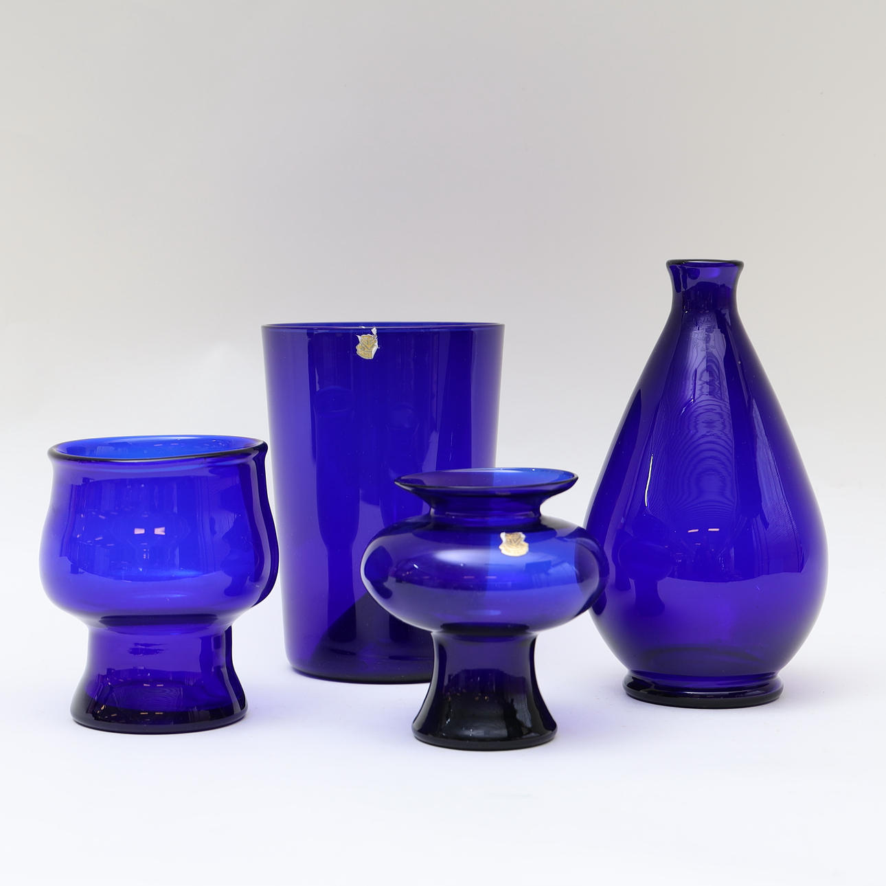 GULLASKRUF, vases 4pcs, blue tinted glass.