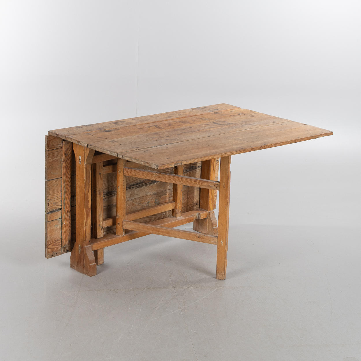 A 19th century wooden percussion table.