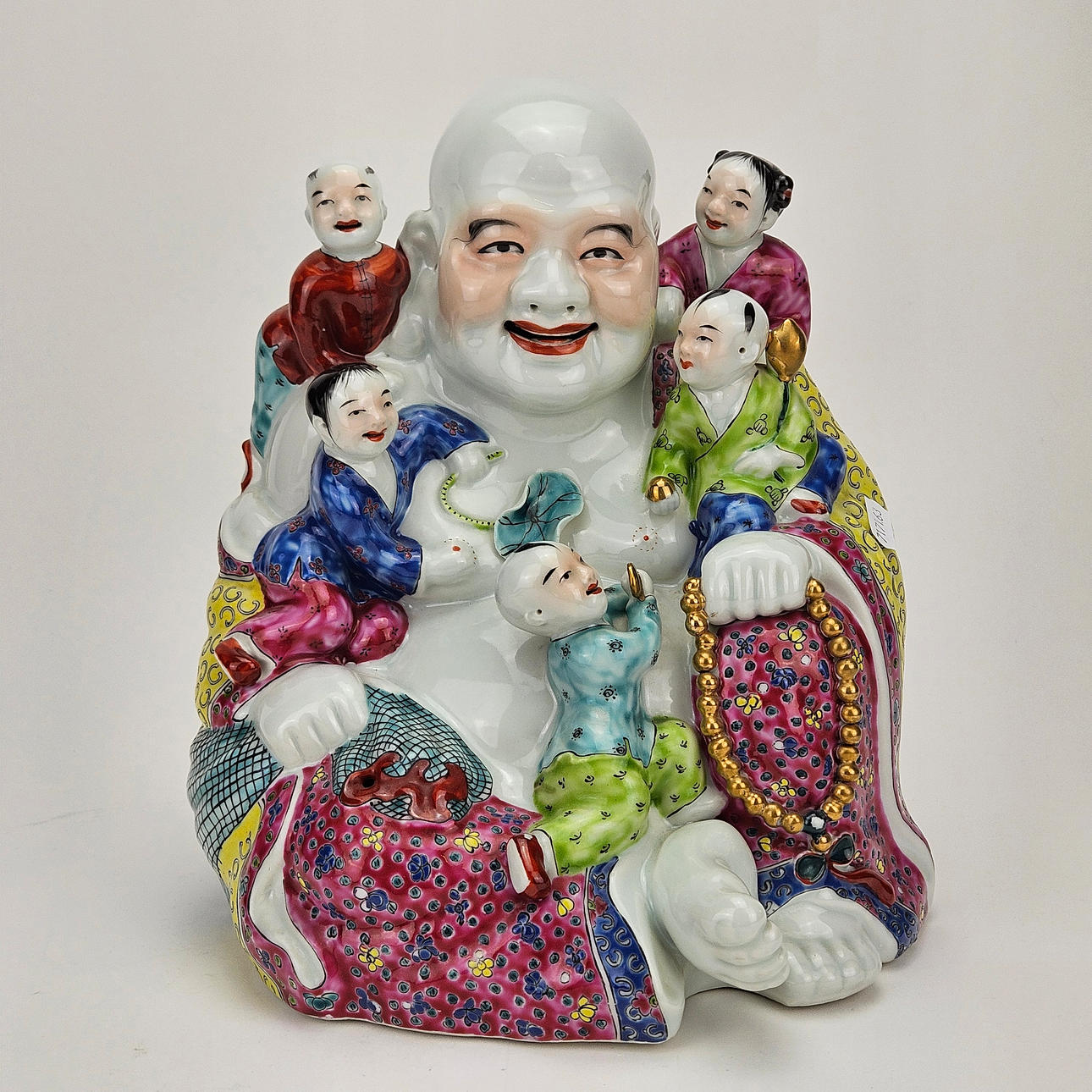 A porcelain Buddha, China.