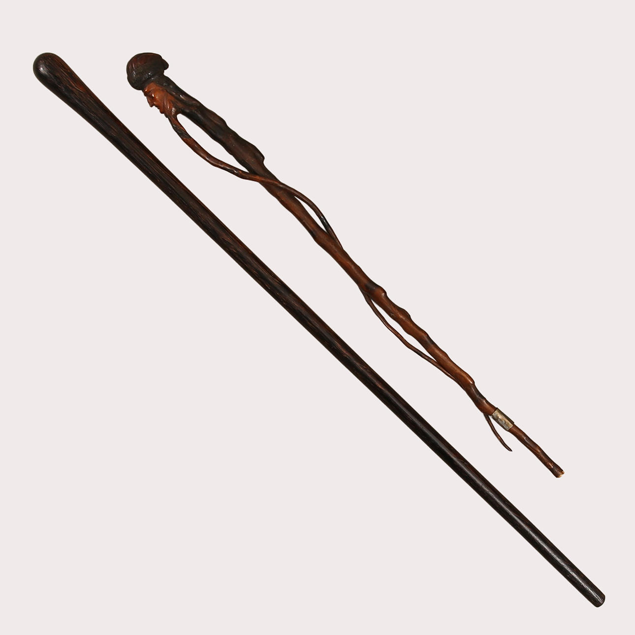 CANES. Cropped man's head with a long beard. Smooth cane.