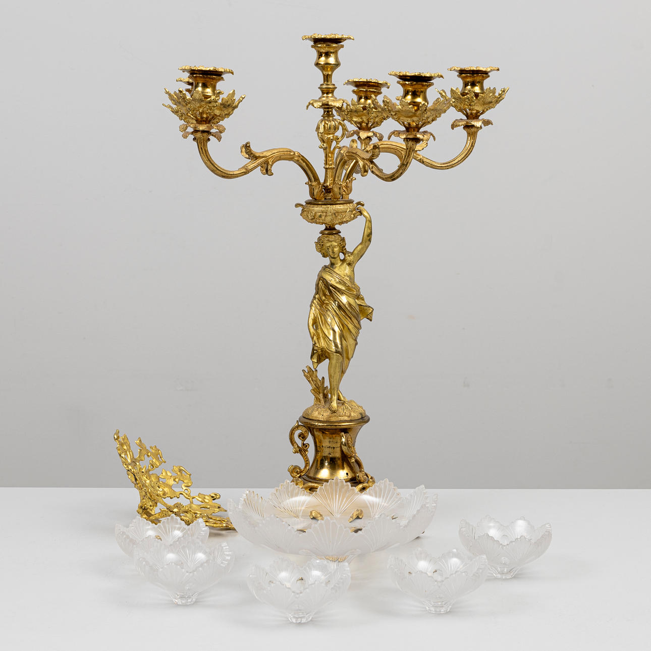 A late 19th century gilt brass candelaber/table set.