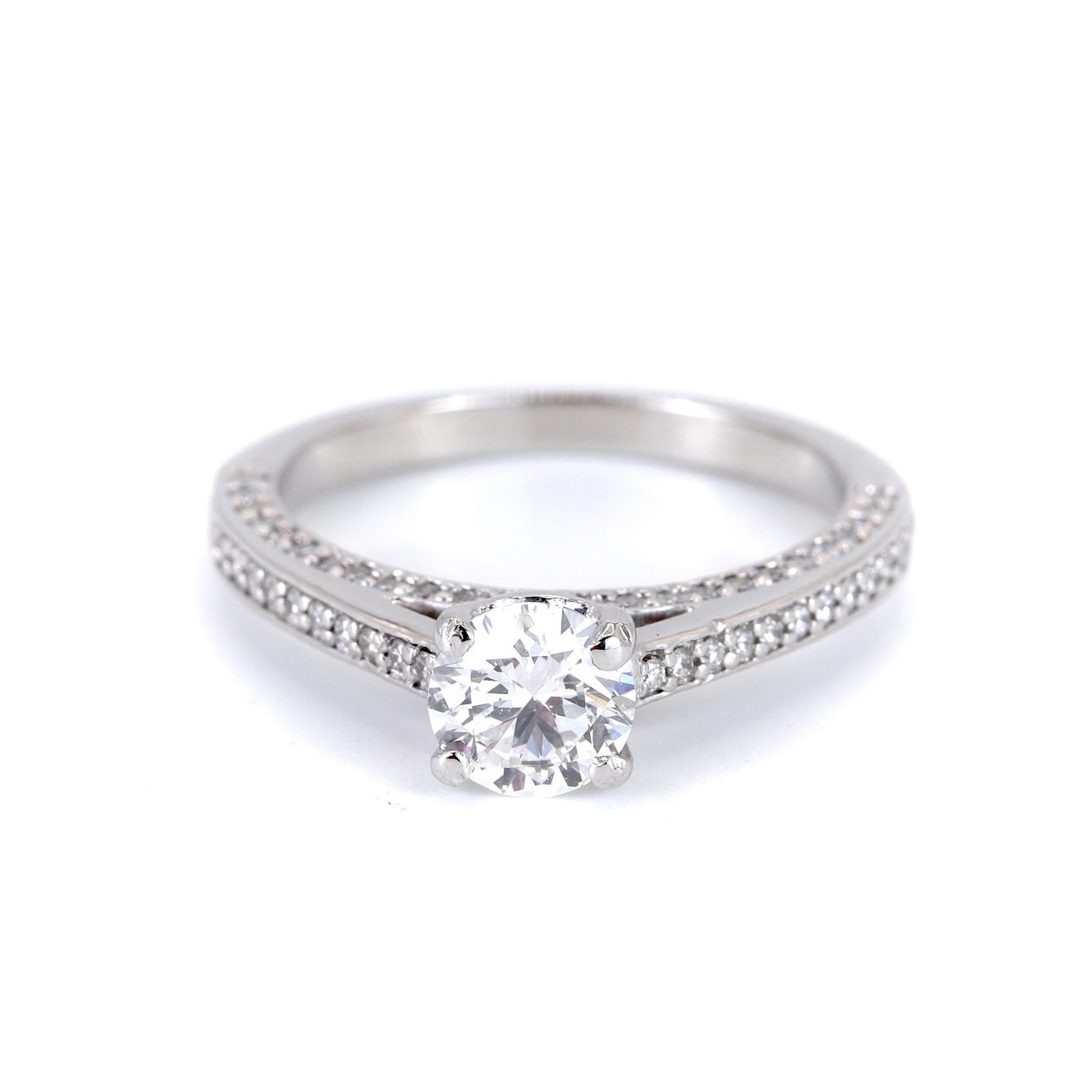 PLATINUM DIAMOND SET SOLITAIRE RING.