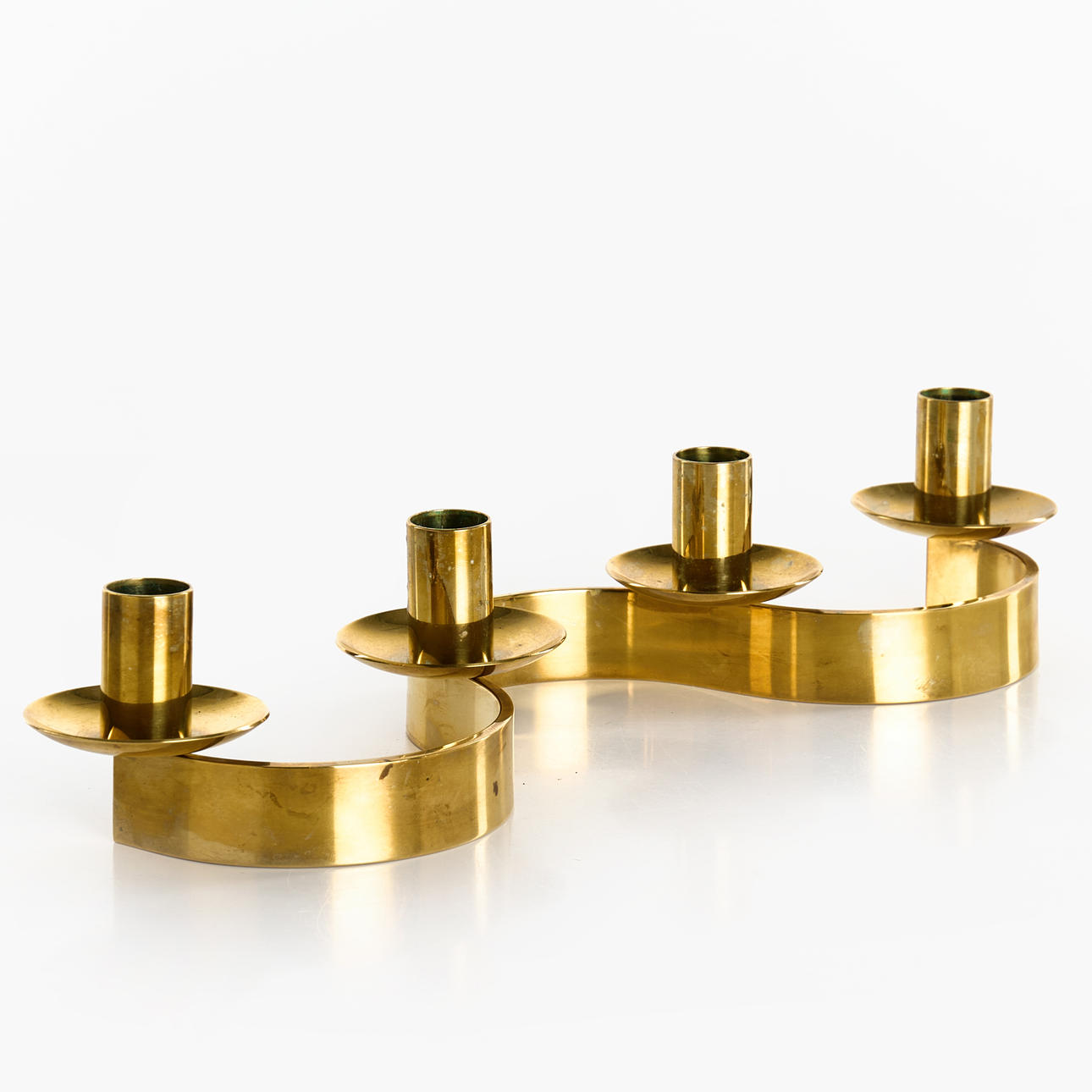 JOSEPH FRANK. Candlestick “Slingan” brass.