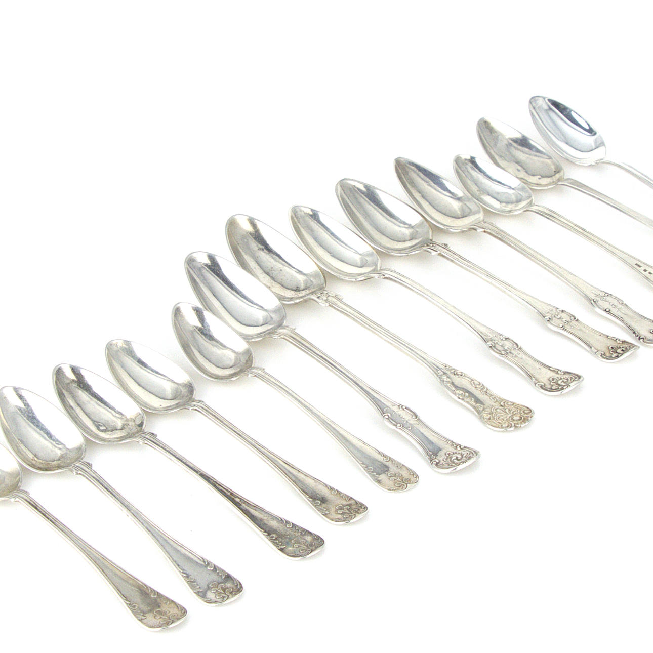 COFFEE & TEASPOONS 13 pcs. six different designs, silver, 1855-1950.