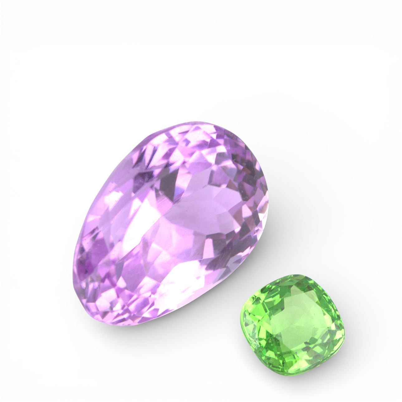ÄDELSTENAR, 2 st. Kunsit 10,33 ct och Tsavorit 1.10 ct, slipade ...