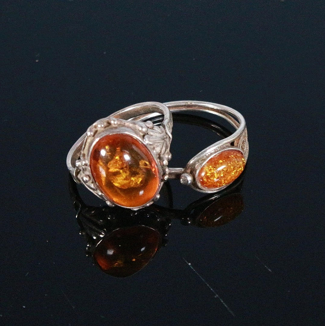 Two rings with pressed amber, 925 silver.