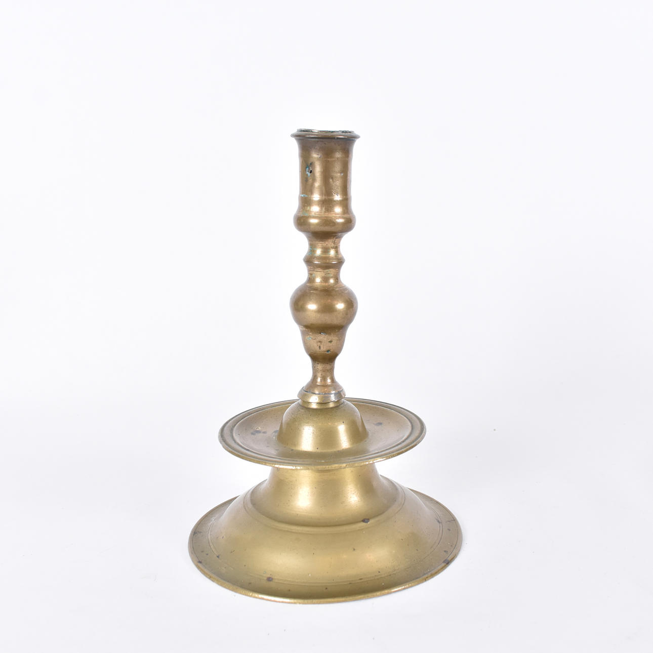 A baroque brass candlestick, 17th century.