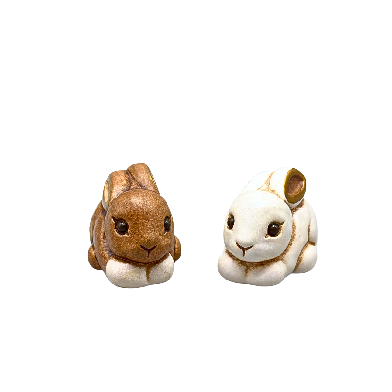 TWO CERAMIC BUNNIES FROM THUN, DECORATED BY HAND.