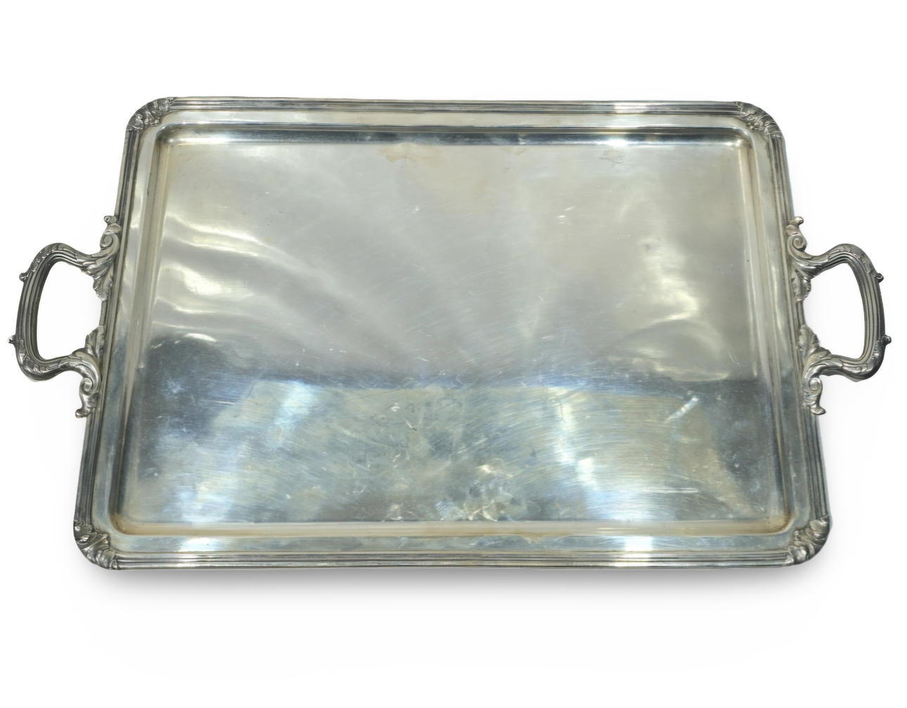 Stor Bagués silverbricka med handtag i rullar.
