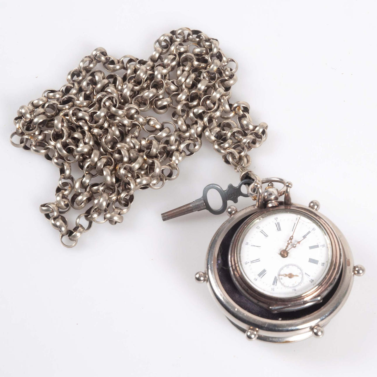 POCKET WATCH/KEY PULLER. Silver and white metal.