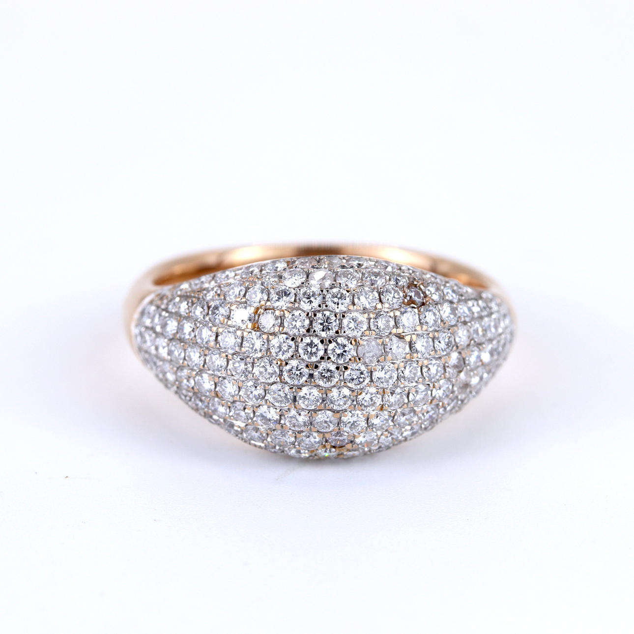 18CT ROSE GOLD DIAMOND SET RING.