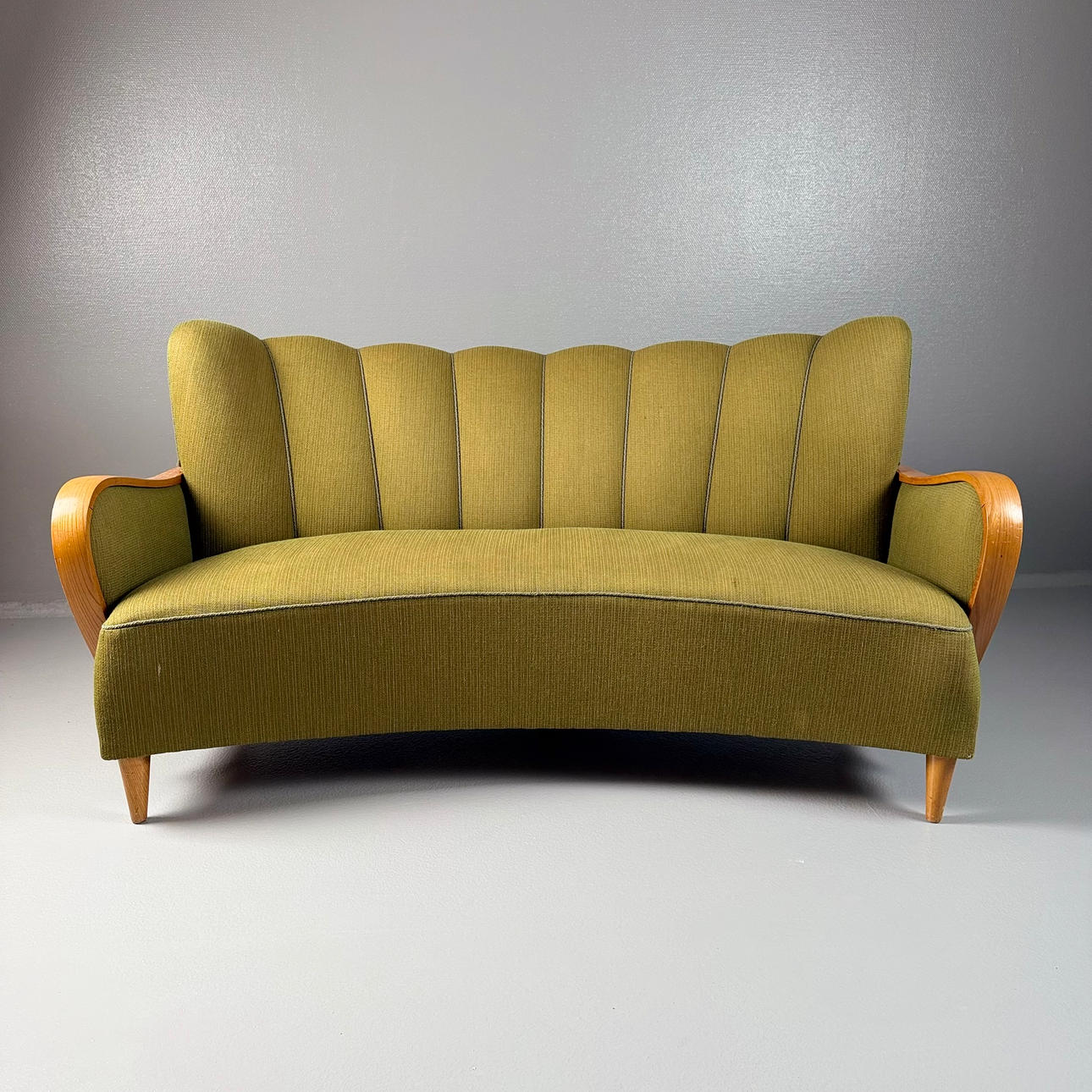 Sofa, 1940s, upholstered in green wool textile.