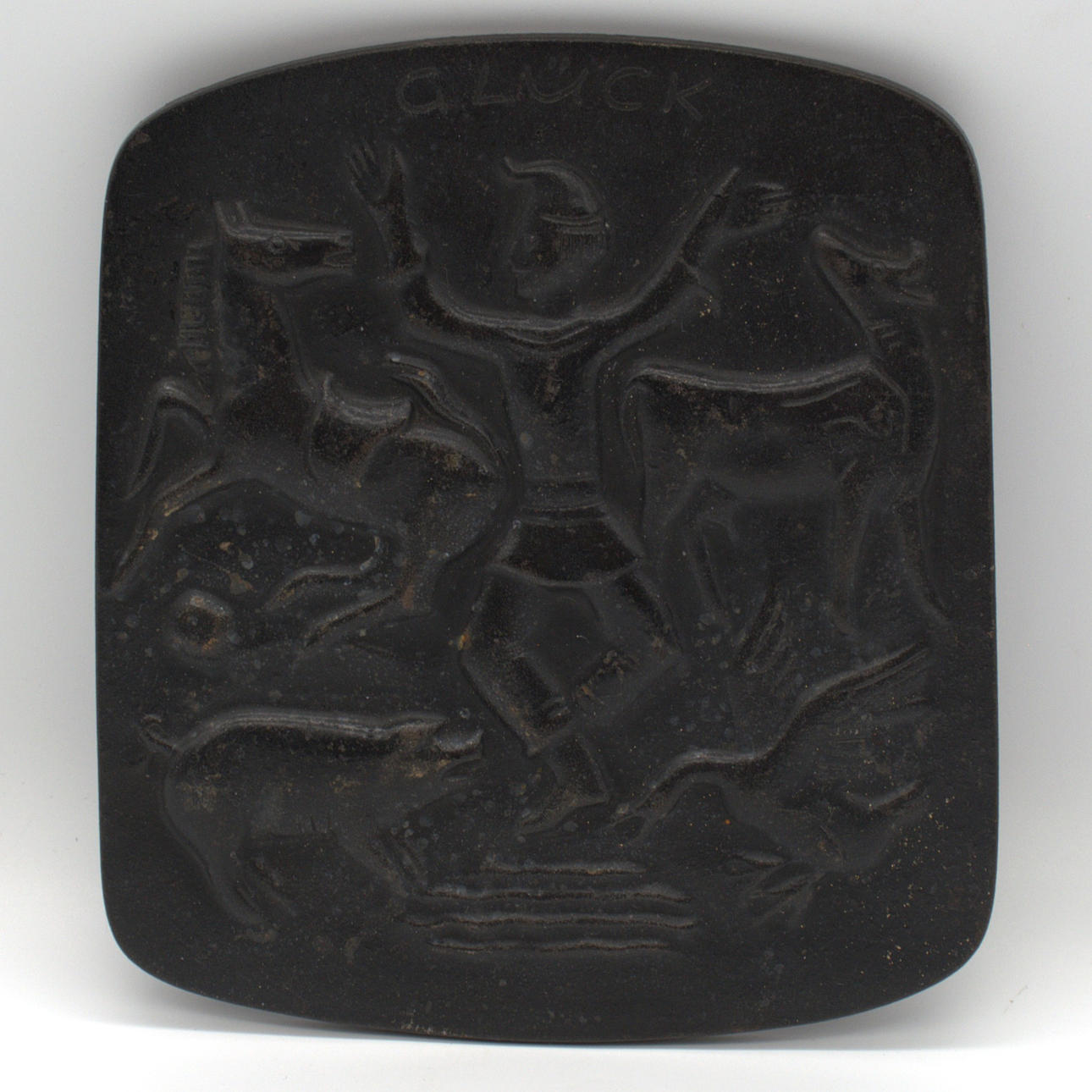 BRONZE WALL RELIEF “HANS IM GLÜCK” AROUND CA. 1950.