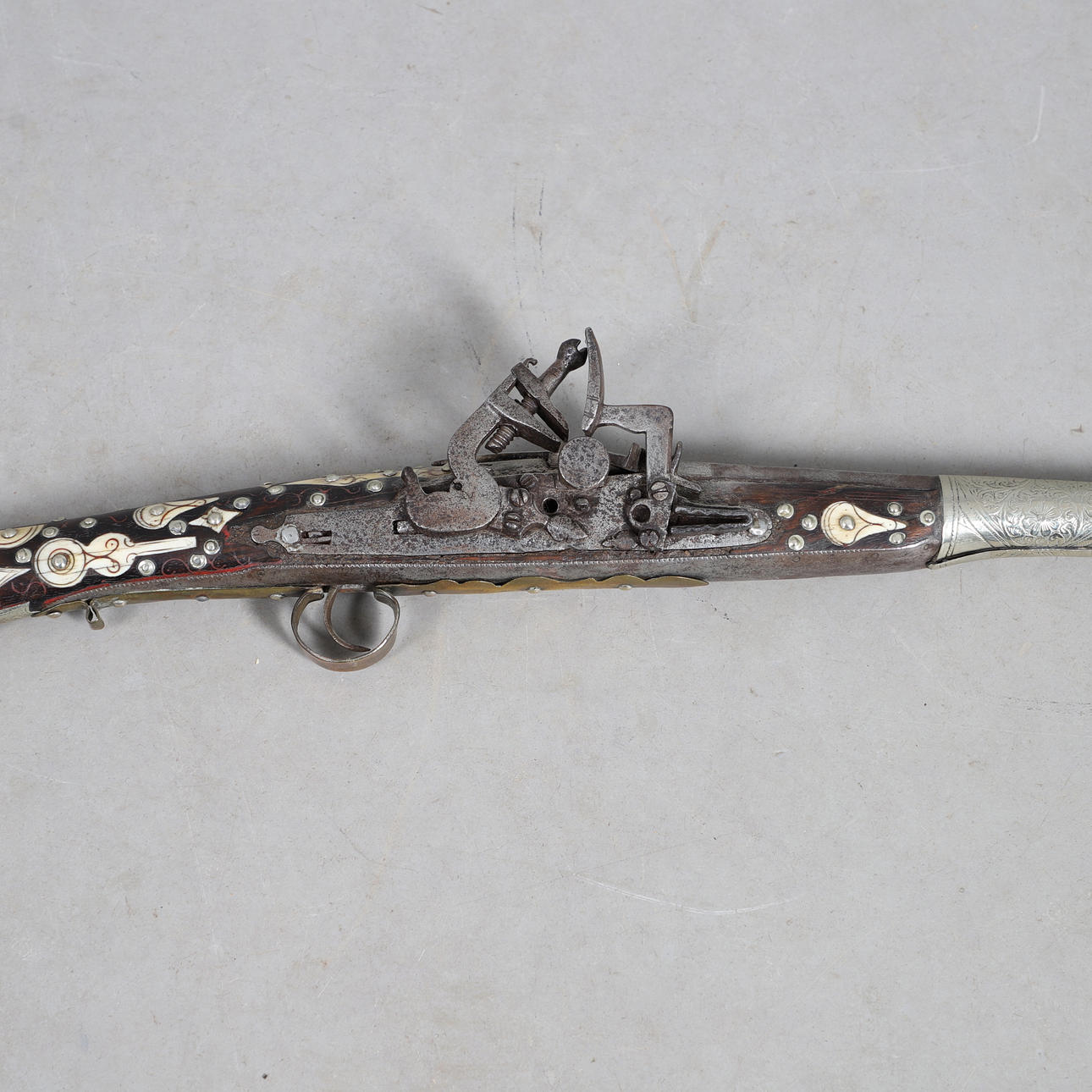 A FINELY DECORATED AFGHAN LONG GUN WITH MIQUELET ACTION. Weapons ...