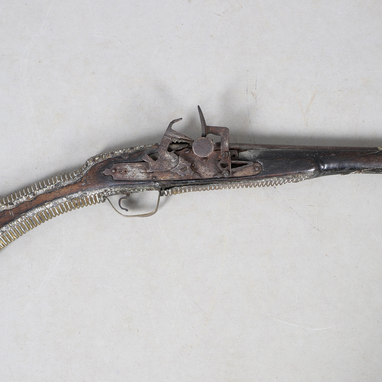 A FINELY DECORATED AFGHAN LONG GUN WITH MIQUELET ACTION. Weapons ...