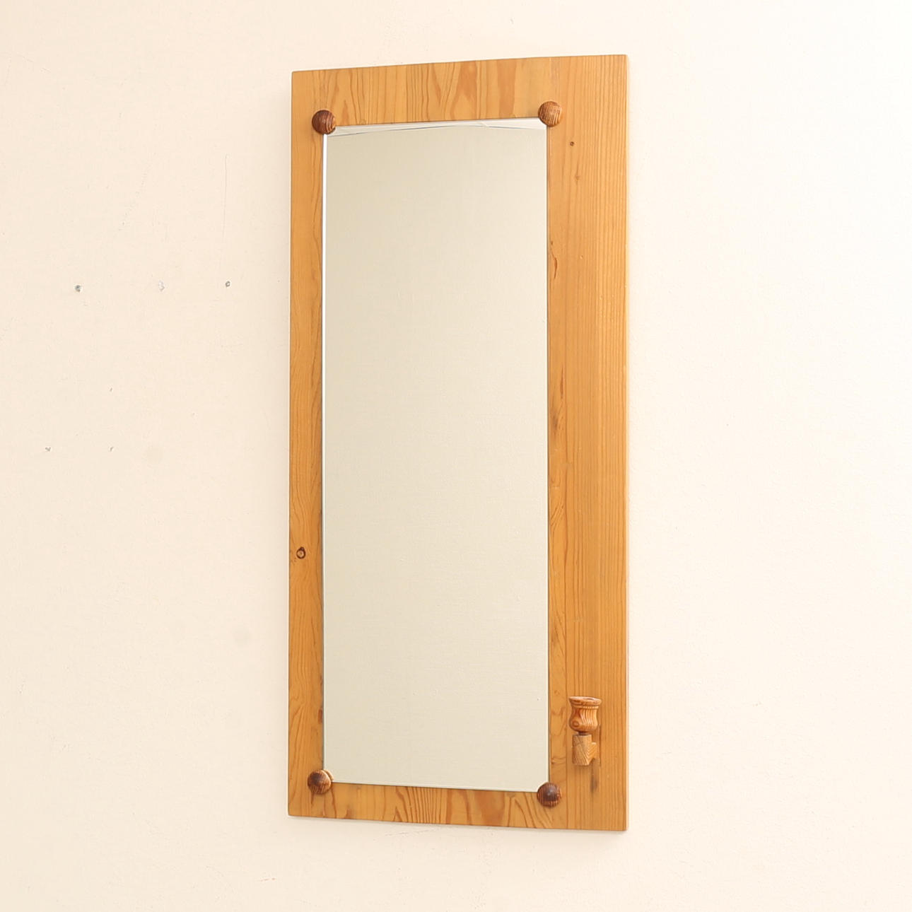 A mirror, pine with candle holder, 1970s.