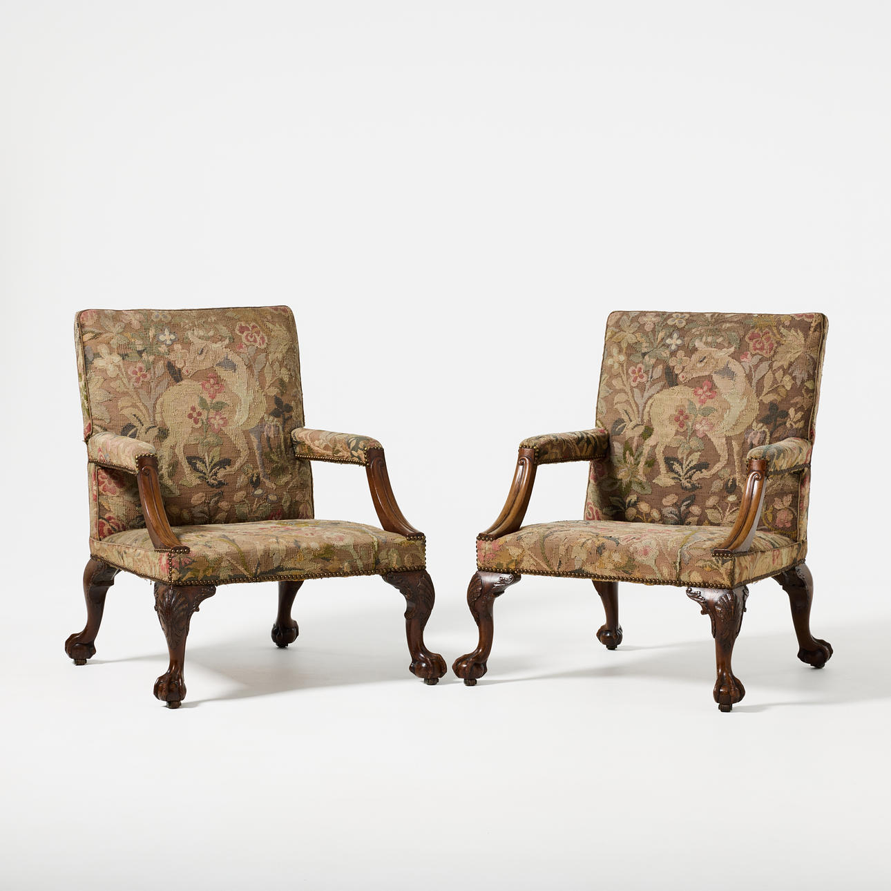 A pair of George II style library armchairs, England 19th century ...
