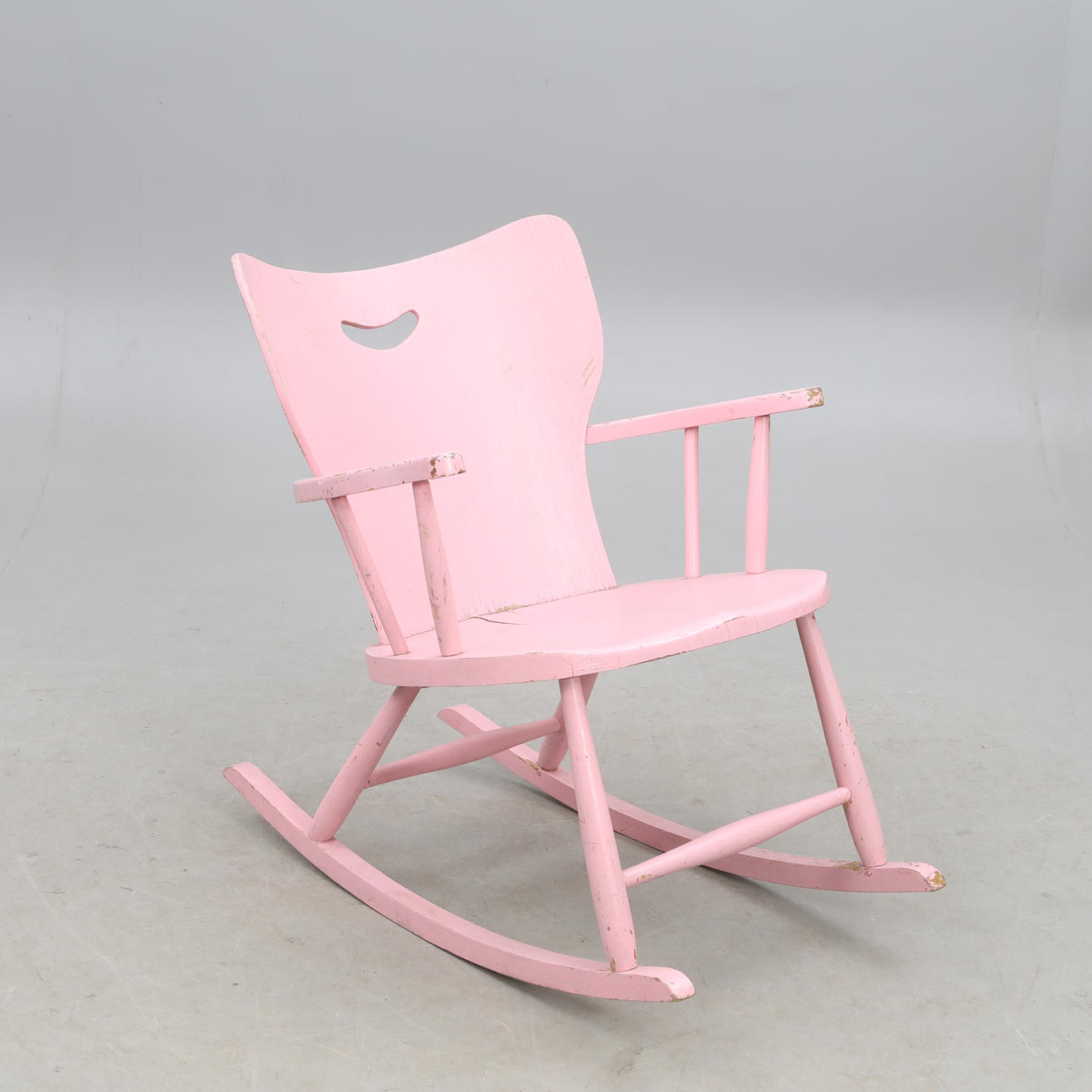 A rocking chair, painted, 20th century.