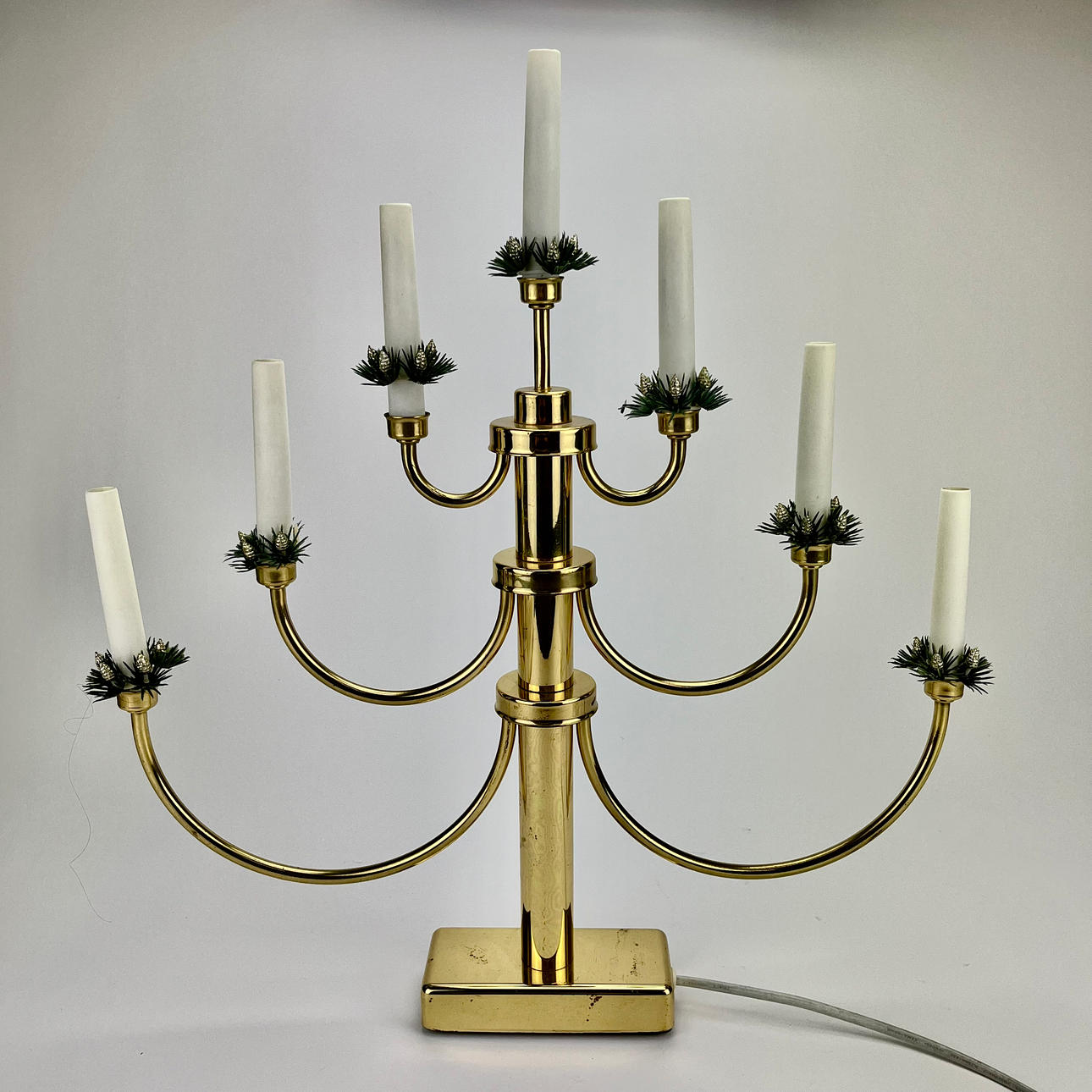 An electric candlestick, brass, Konstsmide.