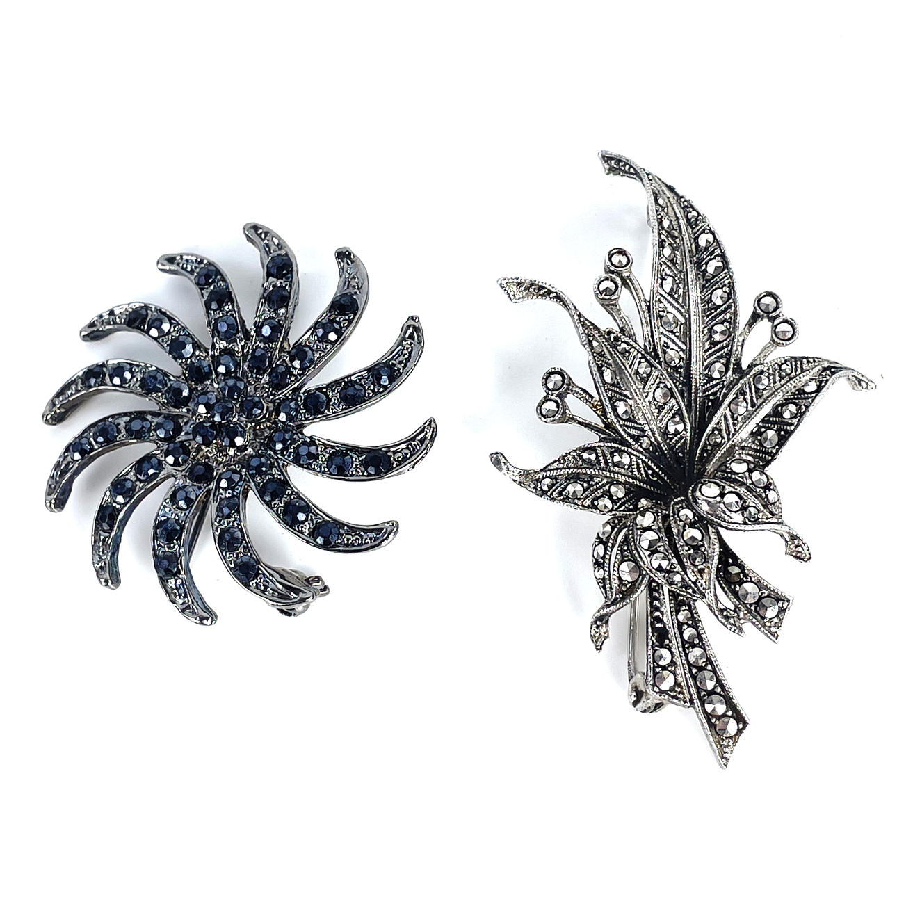 BROSCHER, 2 st. Silver/metall, med markasiter.