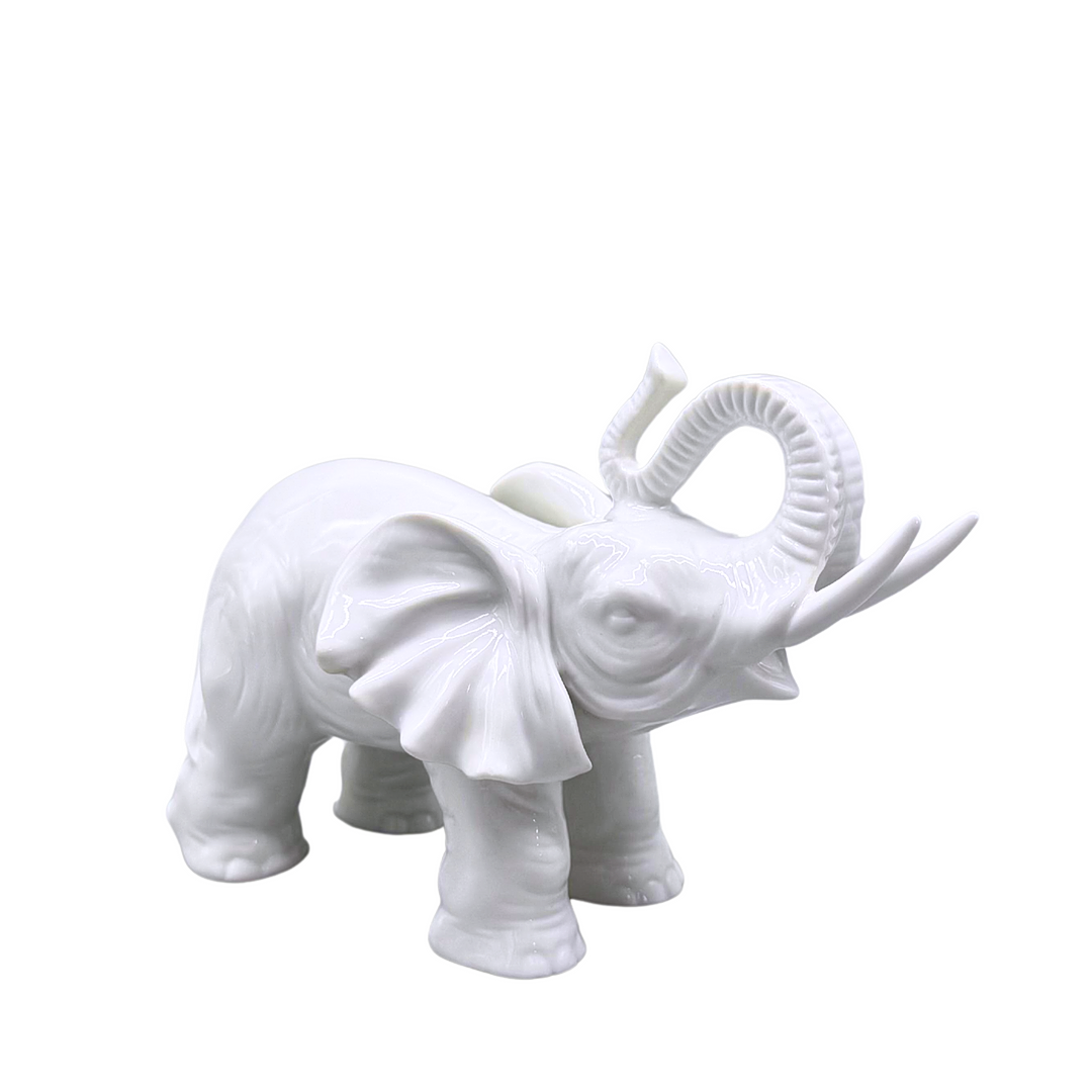 ELEPHANT PORCELAIN FIGURINE.