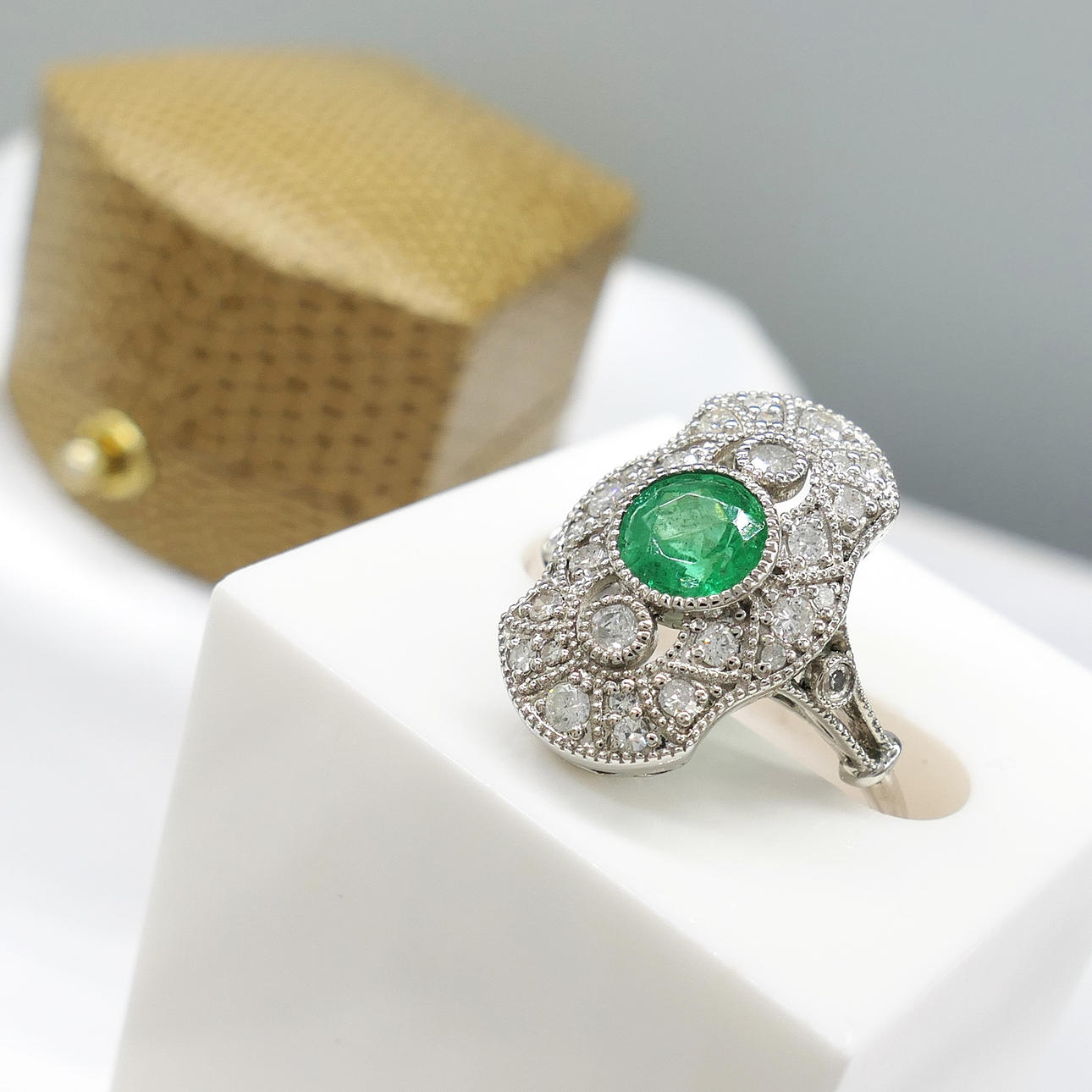 PLATINUM, EMERALD & DIAMOND ring.